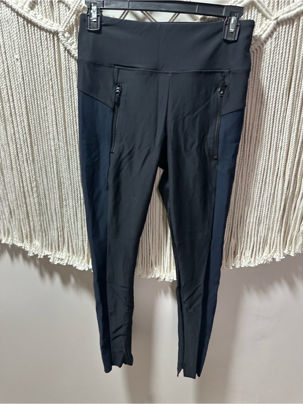 Athleta Black Leggings with Navy Side Panels and Zip Pockets